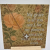 Decorative card with floral design and inspirational quote on a white background
