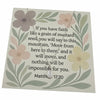 Decorative card with floral design and motivational quote on a white background, with mustard seed necklace