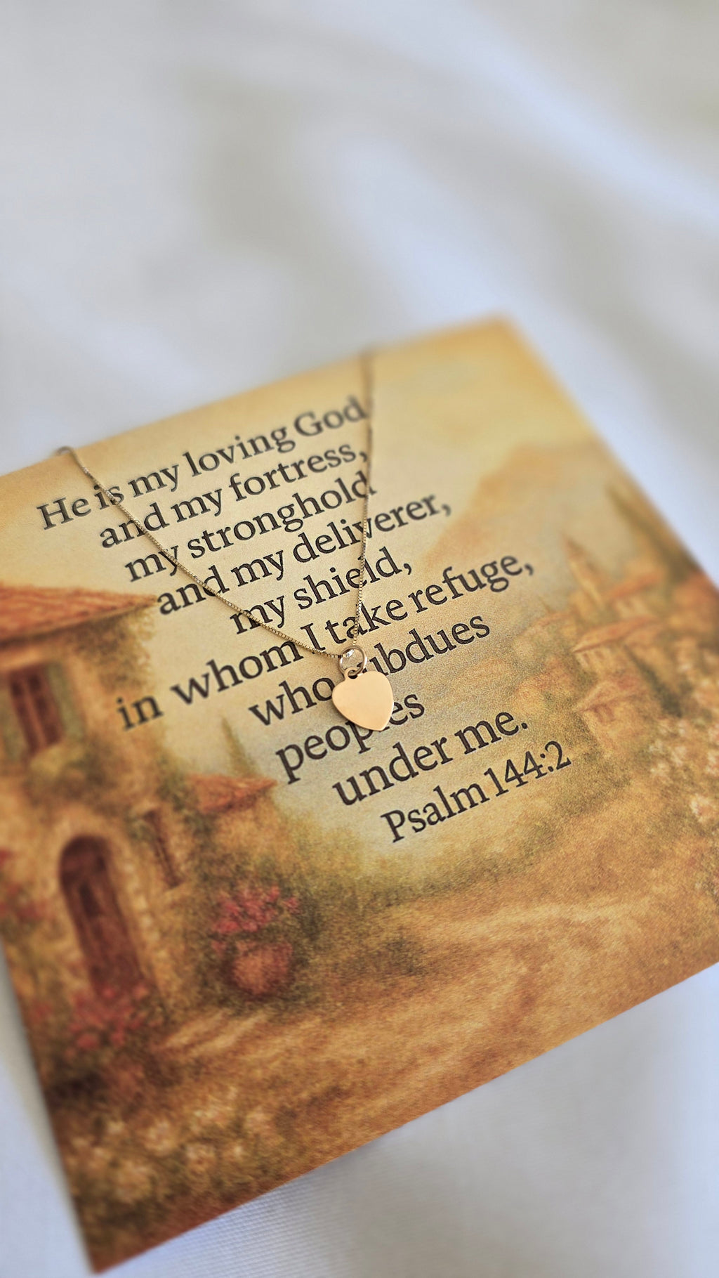 Scripture card with gold heart necklace. Psalm 144:2
