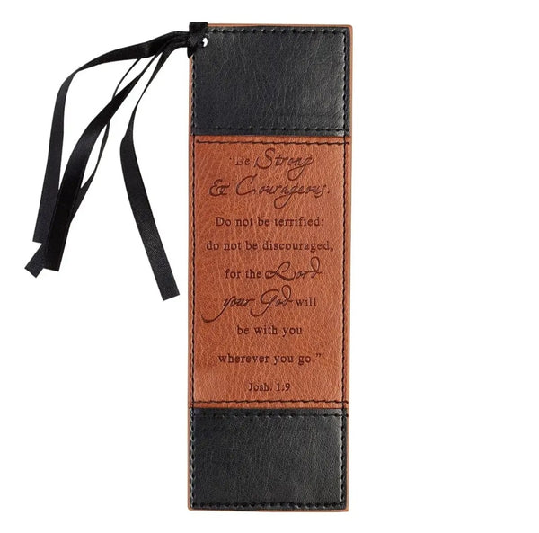 Leather bookmark with black ribbon and engraved text on a white be background,be strong and courageous