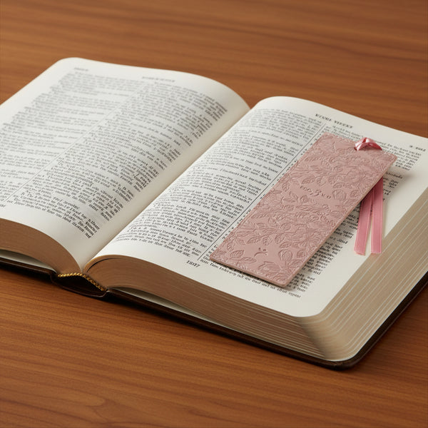 Pink floral-patterned bookmark with a pink tassel 