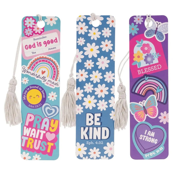 Three colorful bookmarks with tassels on a white background, God is good