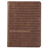 Brown leather notebook with engraved For I Know The Plans I Have For You on a white background