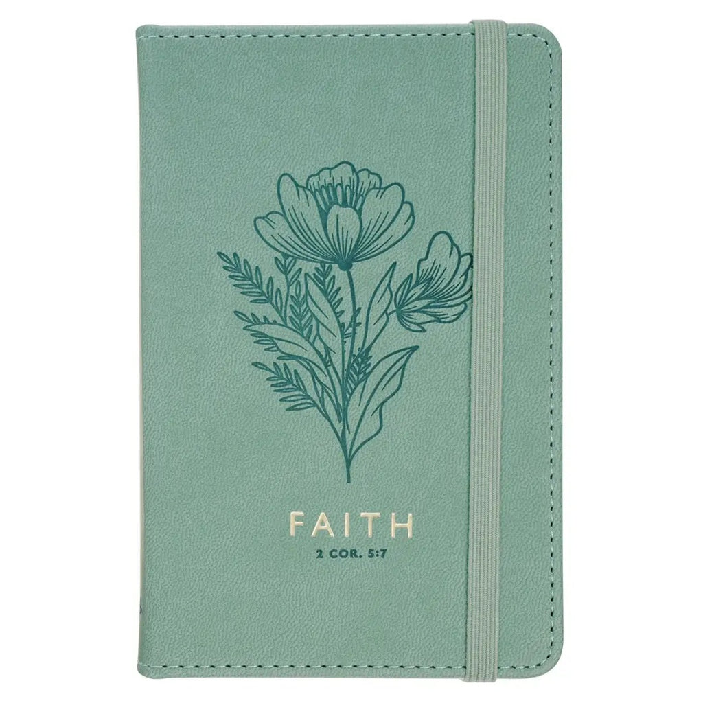Green notebook with floral design and 'FAITH' text on a white background